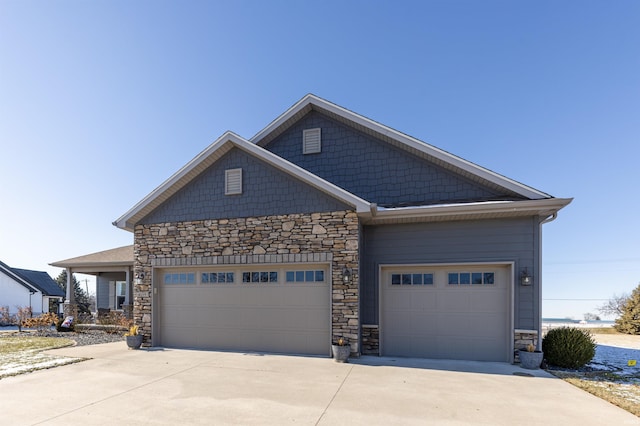 craftsman house with a garage