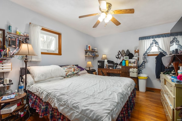 bedroom featuring ceiling fan and light wood-type flooring