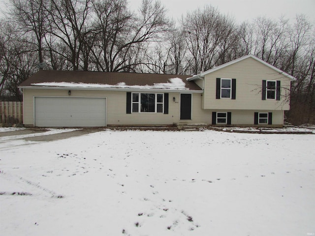 split level home featuring a garage