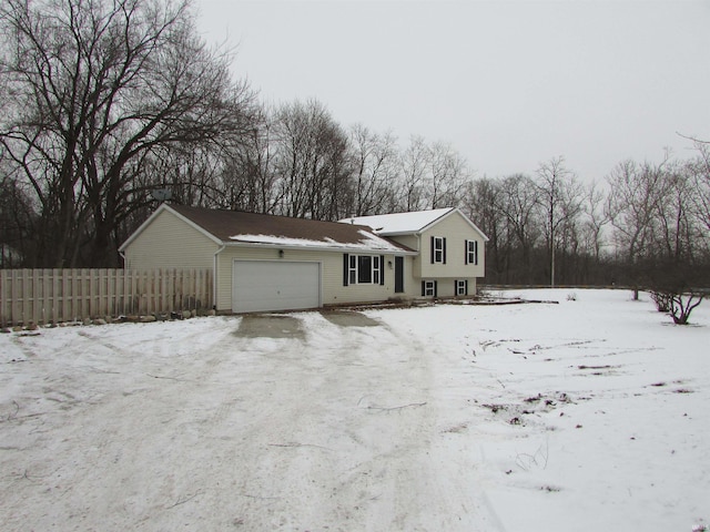 view of front of home with a garage