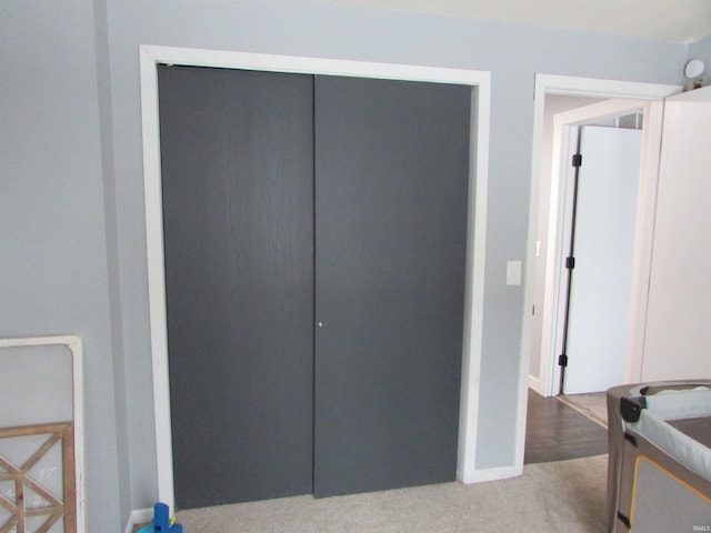 bedroom featuring a closet and carpet