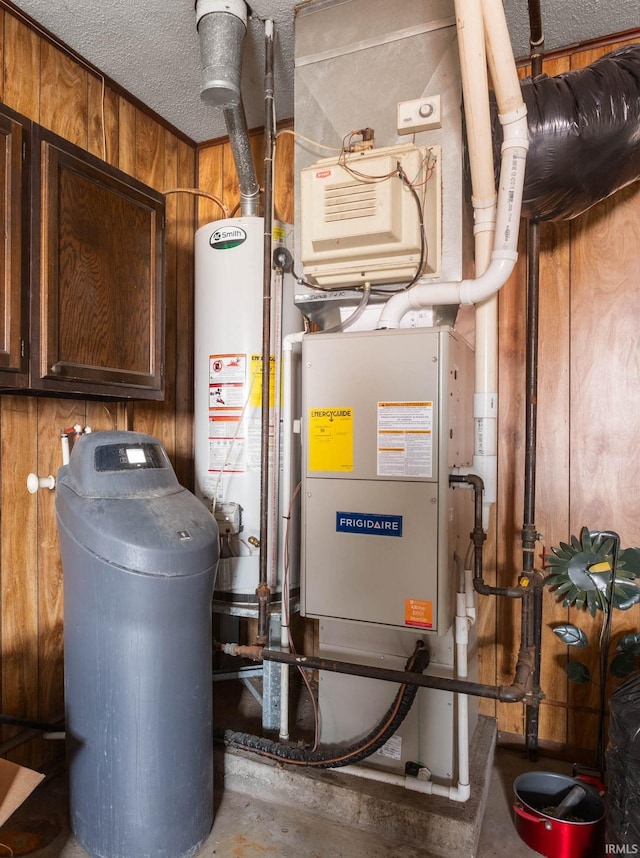 utility room with water heater