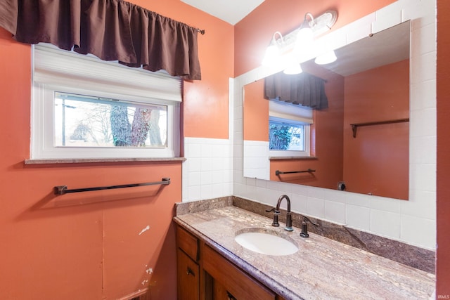 bathroom featuring backsplash and vanity