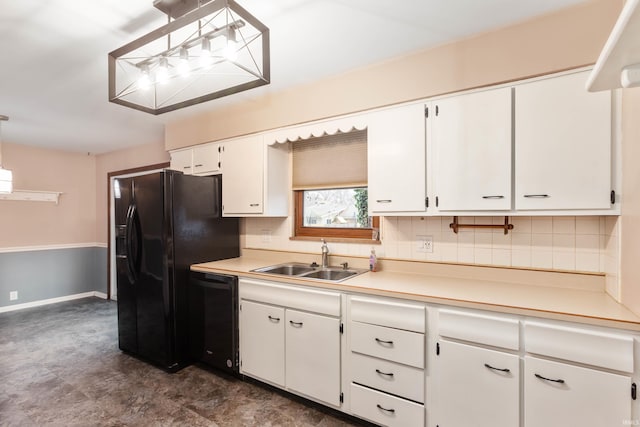 kitchen with decorative backsplash, sink, black appliances, decorative light fixtures, and white cabinets