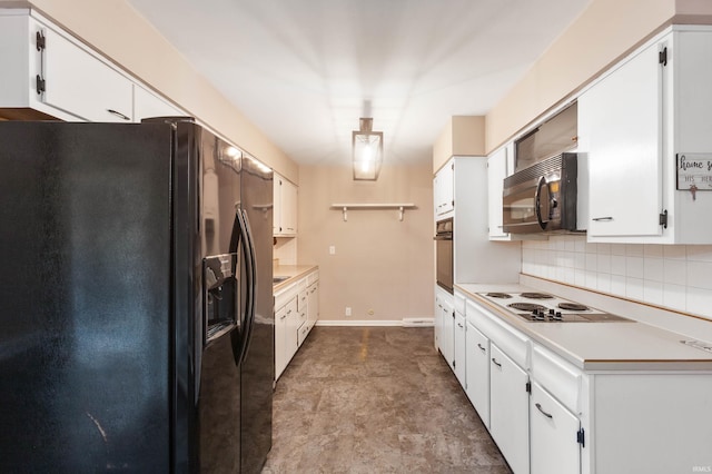 kitchen featuring black appliances, white cabinets, and backsplash