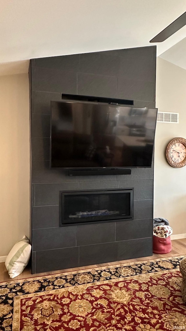 interior details featuring a large fireplace