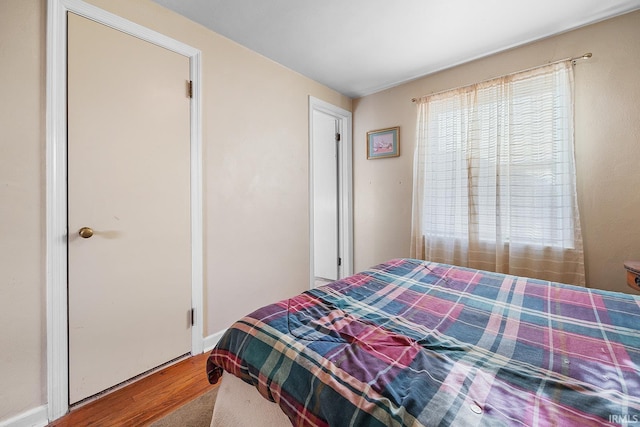 bedroom featuring hardwood / wood-style flooring