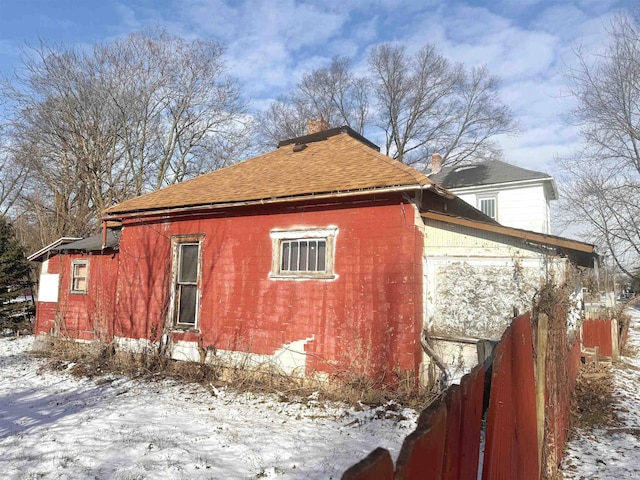 view of snow covered property