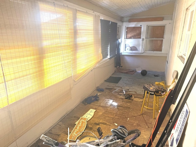 sunroom / solarium with lofted ceiling