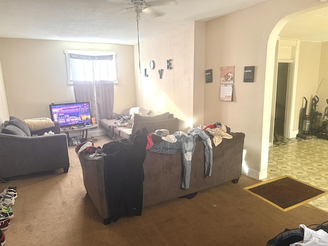 living room with ceiling fan