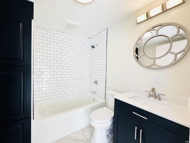 full bathroom featuring vanity, toilet, and tiled shower / bath combo