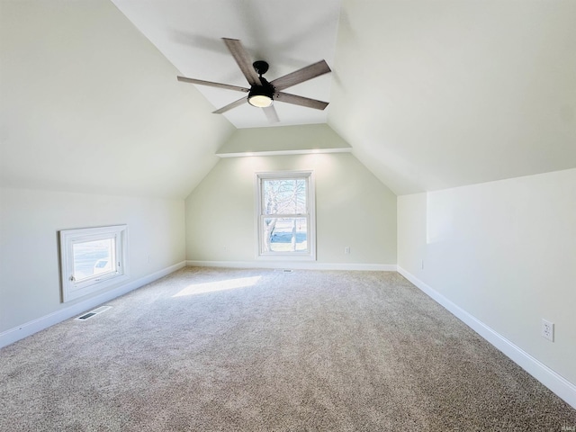 bonus room featuring carpet, ceiling fan, and vaulted ceiling