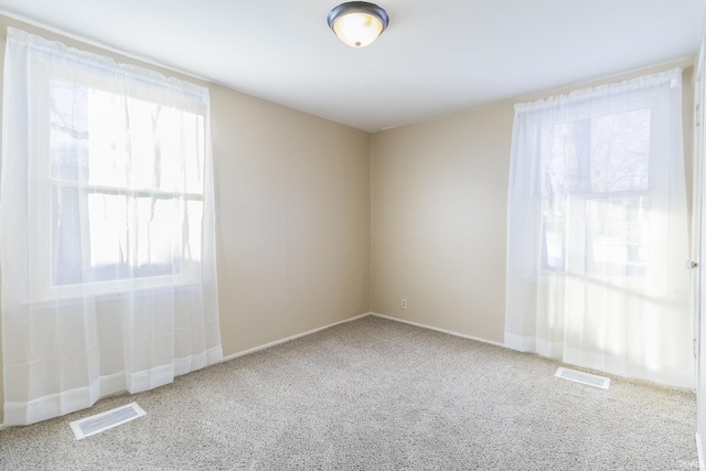 spare room with carpet flooring