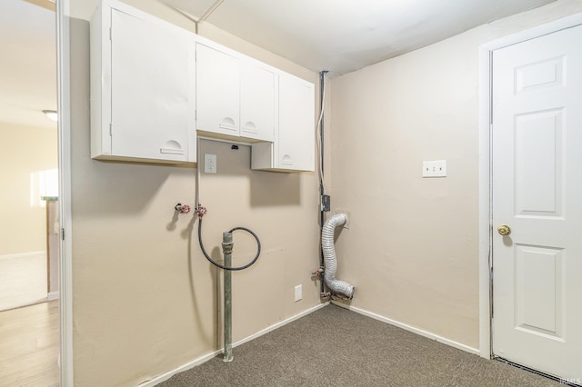 laundry room featuring cabinets, carpet, and washer hookup