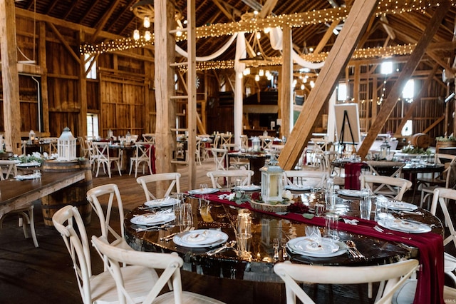 dining space with hardwood / wood-style flooring