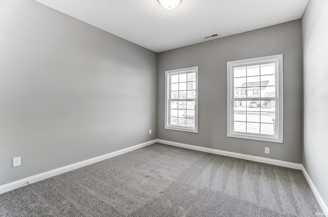 empty room with carpet floors