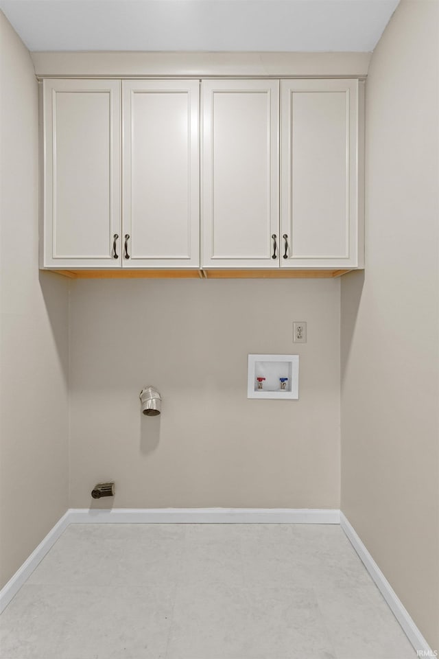 laundry area with cabinets and hookup for a washing machine