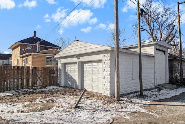 view of snow covered garage