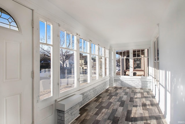 unfurnished sunroom with plenty of natural light