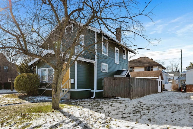 view of snow covered property