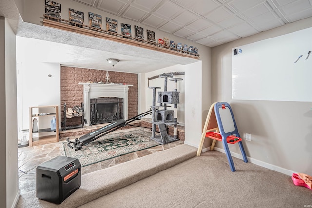 exercise area featuring carpet flooring and a fireplace