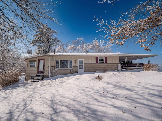 view of front of house featuring a carport