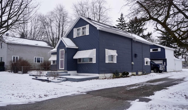 view of snow covered property