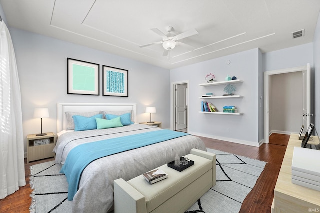 bedroom featuring ceiling fan and hardwood / wood-style floors