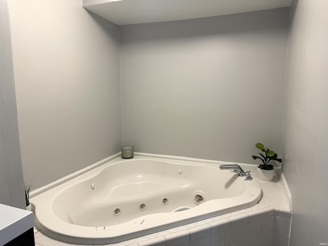 bathroom with tiled tub