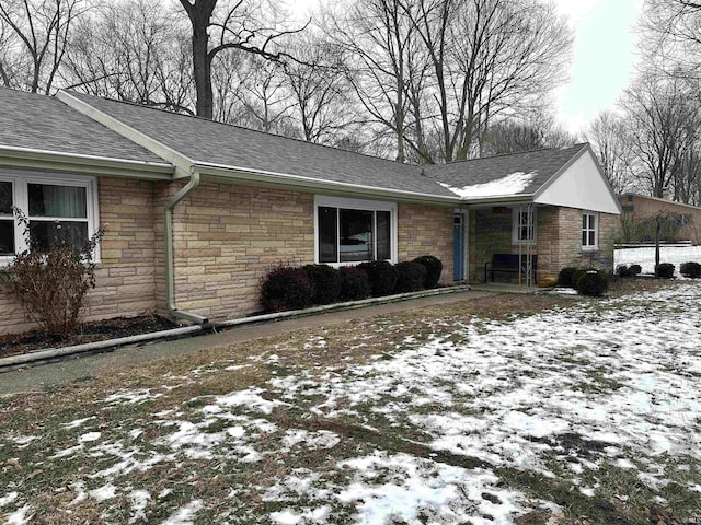 view of snow covered property