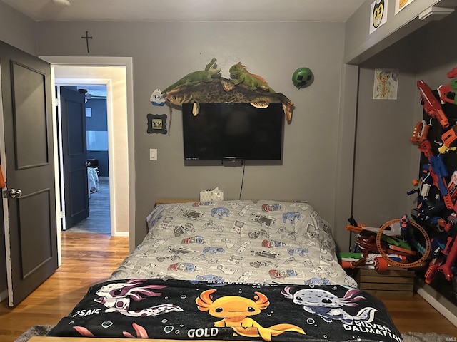 bedroom with light hardwood / wood-style flooring