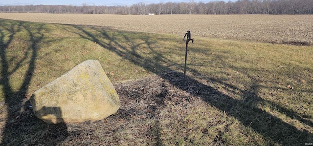 exterior space with a rural view