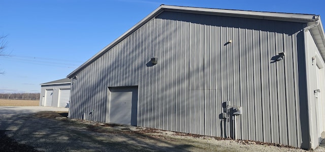 view of outbuilding featuring a garage