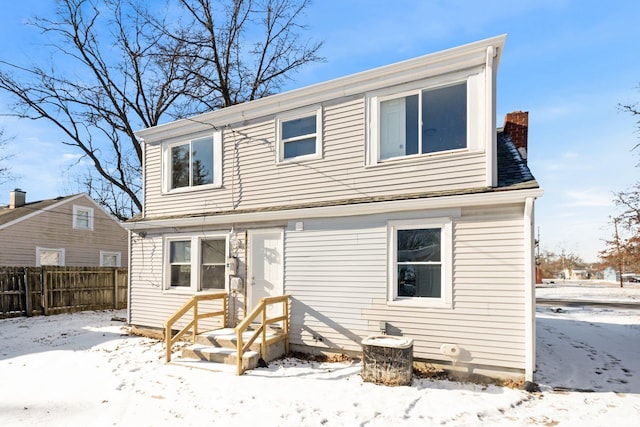 view of snow covered property