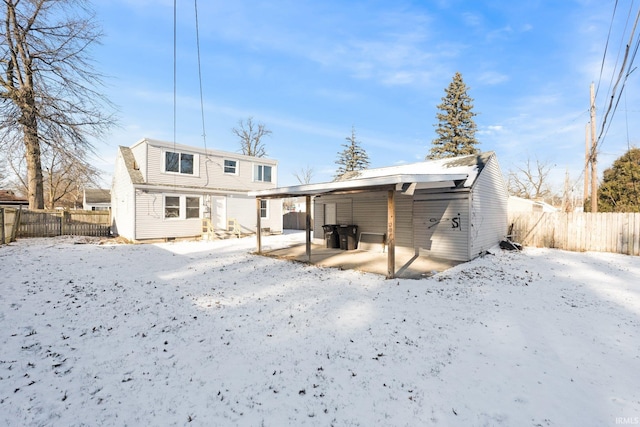 view of snow covered house