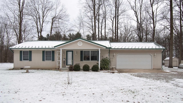 ranch-style house featuring a garage