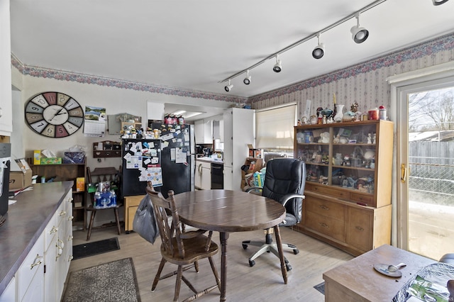 office area featuring wallpapered walls and light wood-style flooring