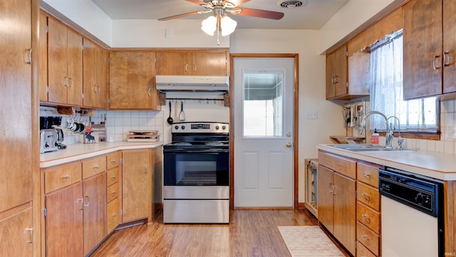 kitchen with dishwasher, sink, light hardwood / wood-style flooring, electric stove, and decorative backsplash