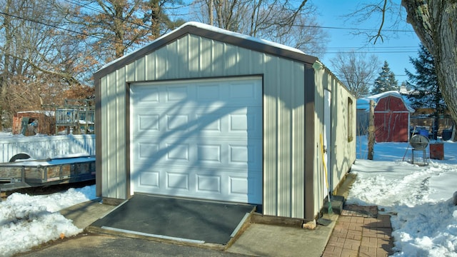 view of snow covered garage