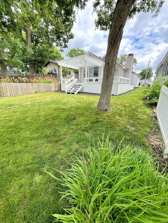 view of yard with a pergola