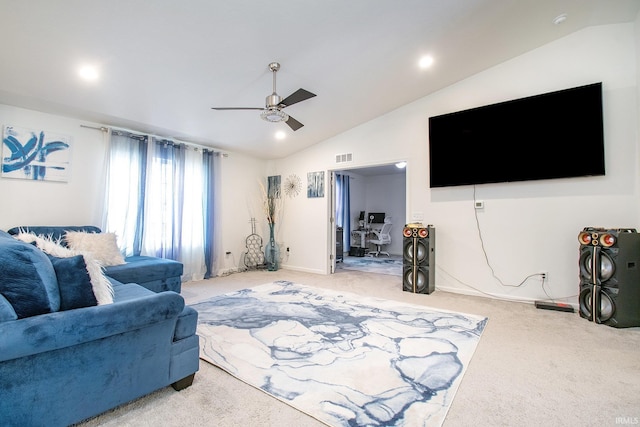 living room with ceiling fan, lofted ceiling, and carpet floors