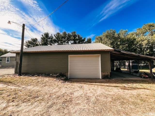 garage with a carport