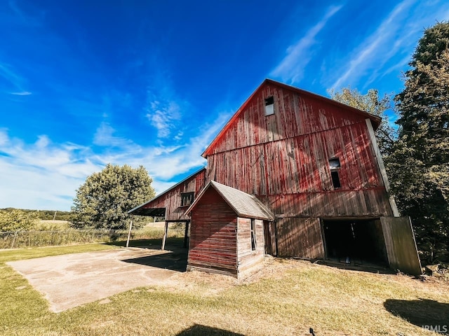 exterior space with a yard and an outdoor structure