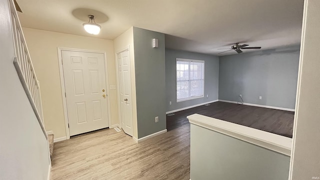 entrance foyer featuring ceiling fan and light wood-type flooring