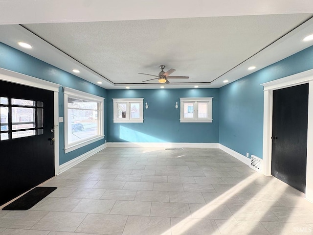 foyer with ceiling fan