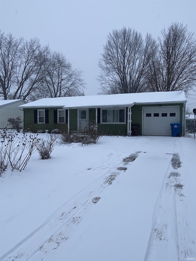 single story home featuring a garage