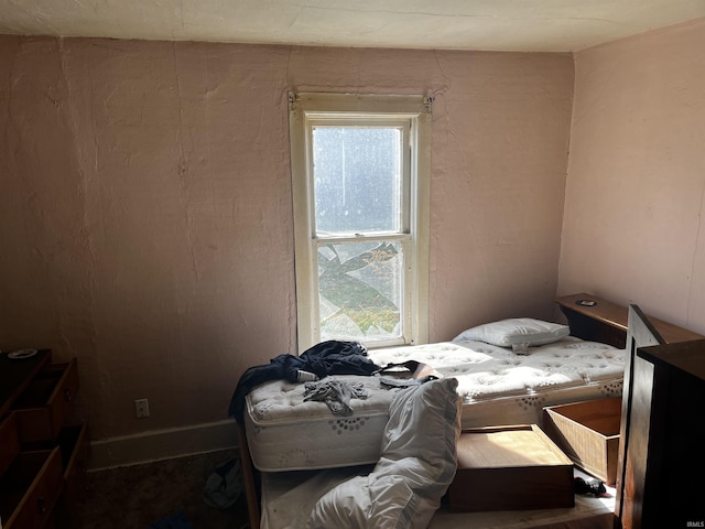 bedroom featuring multiple windows