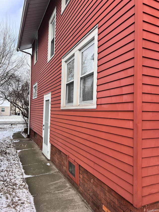 view of snow covered property