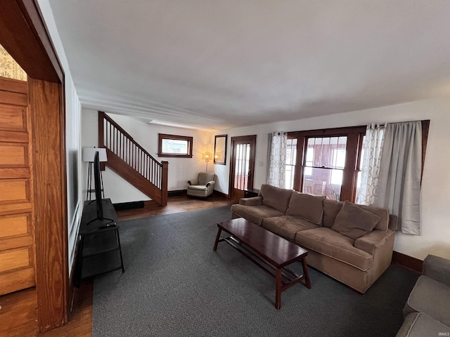 living room with dark hardwood / wood-style flooring