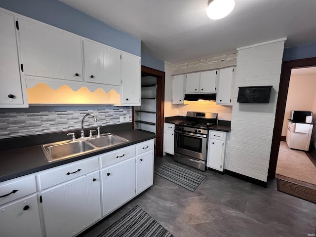 kitchen featuring backsplash, sink, white cabinets, and stainless steel range with gas stovetop